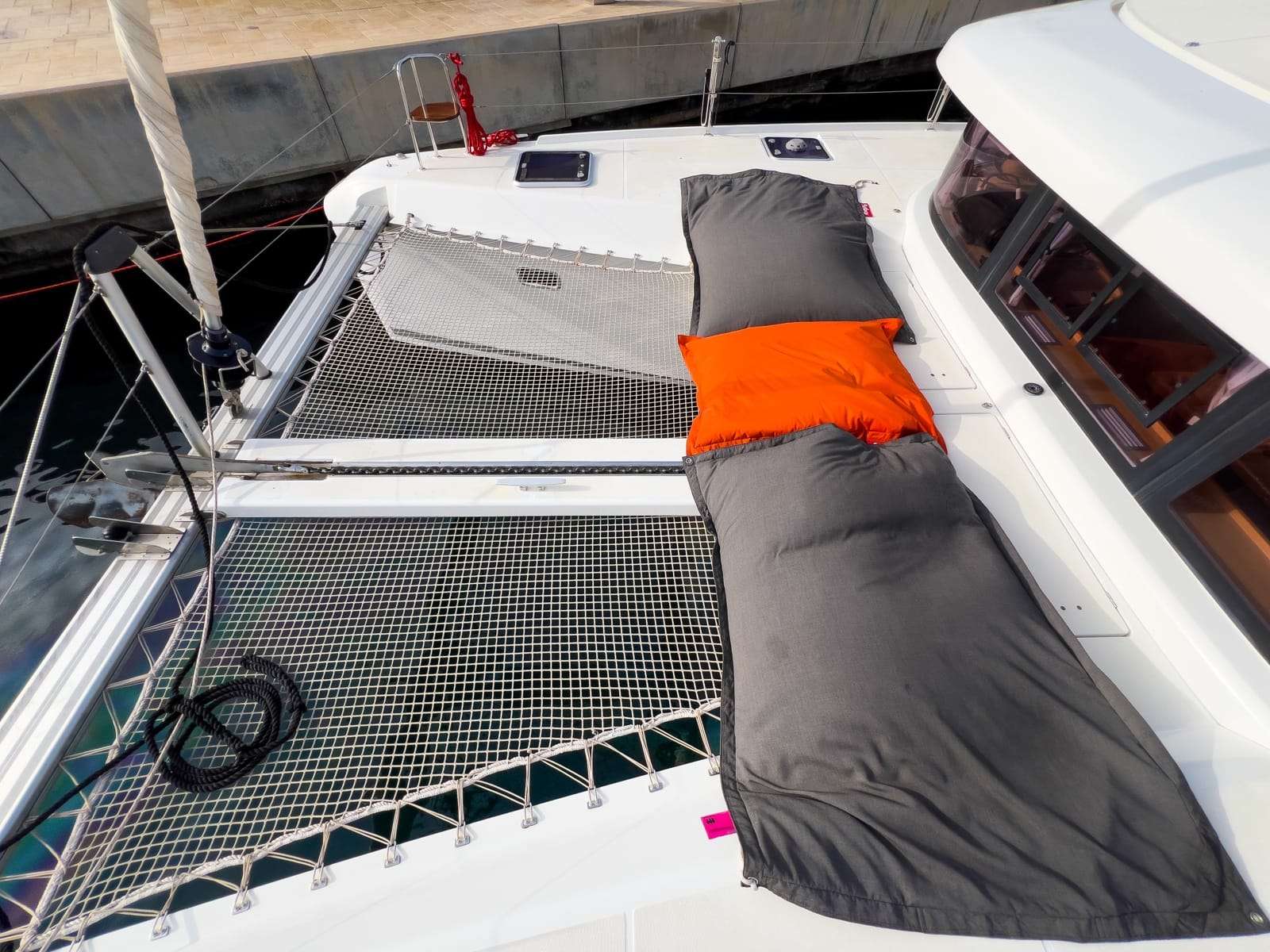 Bow trampoline netting with cushions aboard Bowie Lagoon 42 catamaran