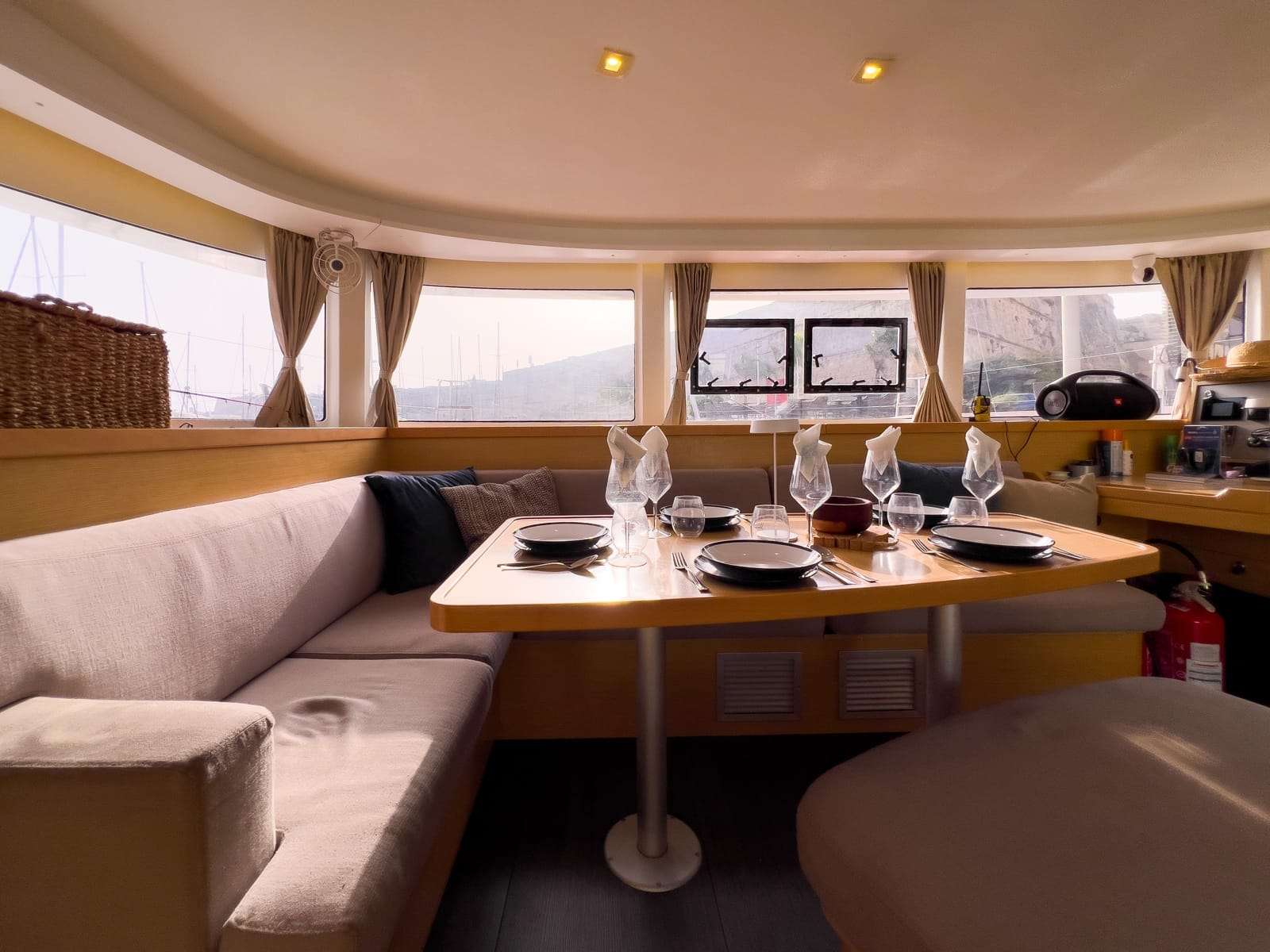 Interior dining table set aboard Bowie Lagoon 42 catamaran